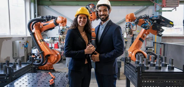 Portrait Man Engineer His Female Collegue Standing Factory Front Robotic — Stock Fotó