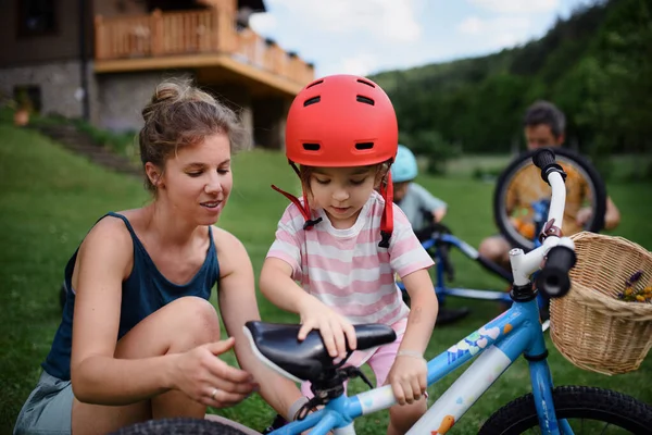 Young Family Little Children Preaparing Bike Ride Front House — Stock Photo, Image