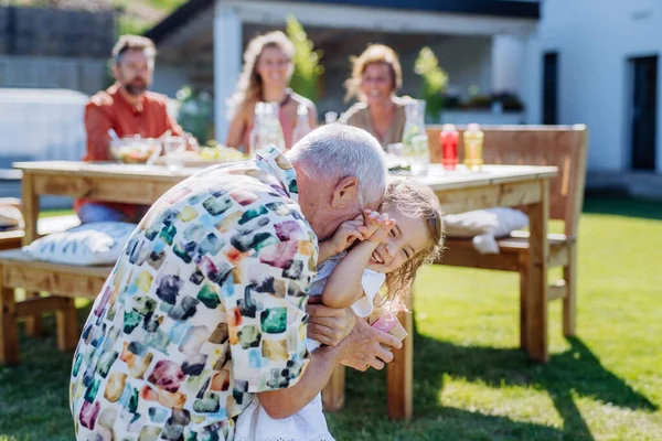 Happy Little Girl Giving Birthday Present Her Senior Grandfather Generation — Stock Fotó