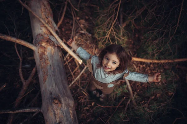 High Angle View Happy Little Girl Arms Outstretched Feeling Free — Fotografia de Stock