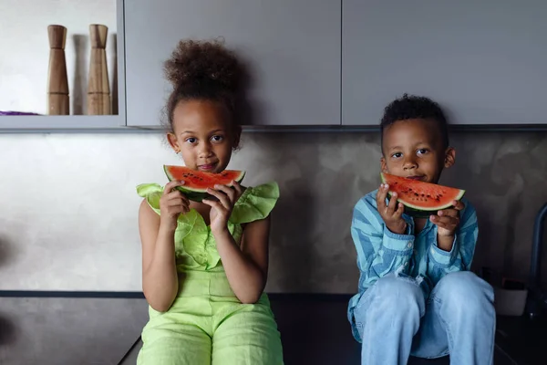 Multiracial Kids Eating Melon Kitchen Hot Sunny Days — 图库照片