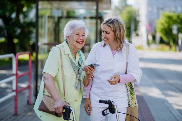 Portrait Caregiver Senior Woman Walk Park Shopping Bag Laughing Talking — 图库照片