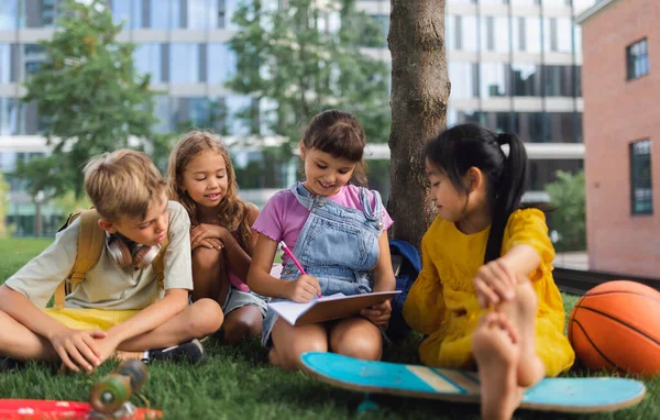 Happy Kids Playing Talking Together City Park Summer Day — стоковое фото