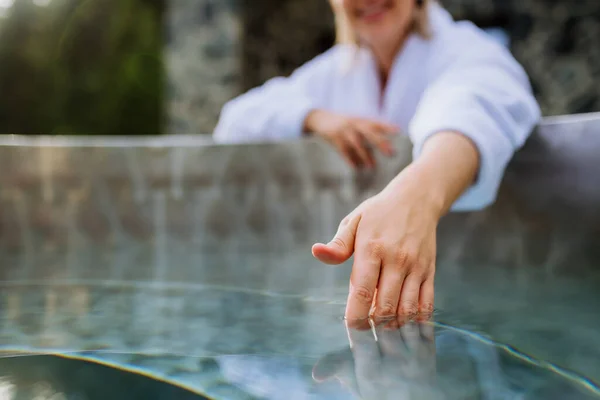 Unrecognizable Woman Towel Touching Water Checking Temperature Ready Home Spa — Fotografia de Stock