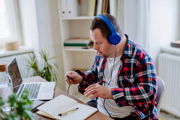 Young Man Syndrome Sitting Desk Office Using Laptop Listening Music — Foto Stock