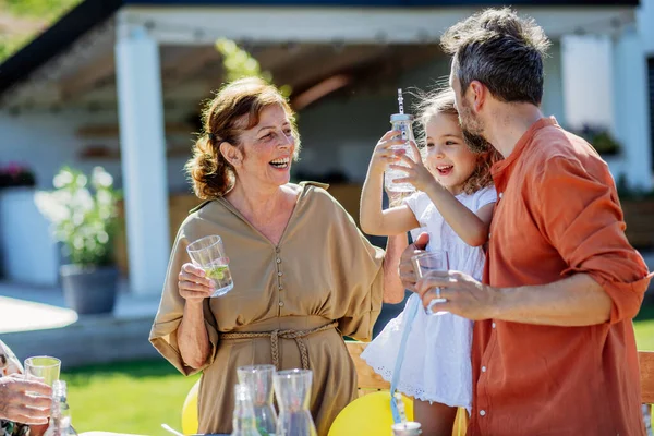 Multi Generation Family Having Garden Party Celebration Little Girl Her — Stock Fotó