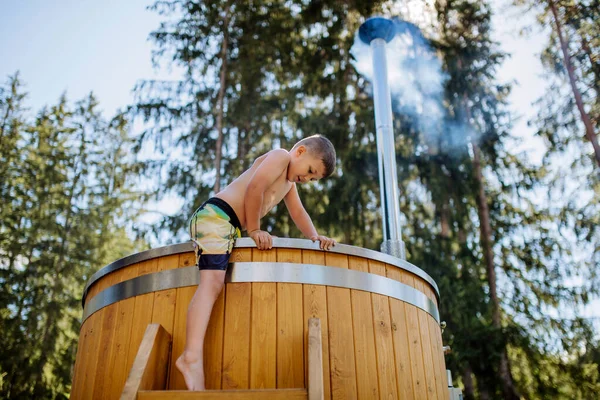 Little Boy Swimsuit Climbing Outdoor Wooden Hot Tub Surrounded Forest — 图库照片