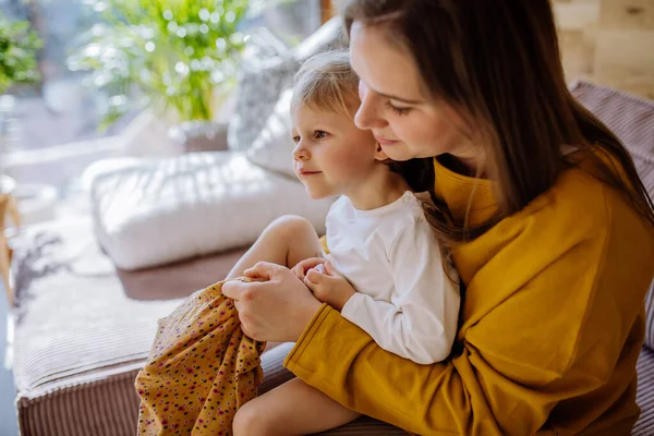 Young Mother Dressing Her Little Cute Daughter Home Moterhood Concept — Stockfoto