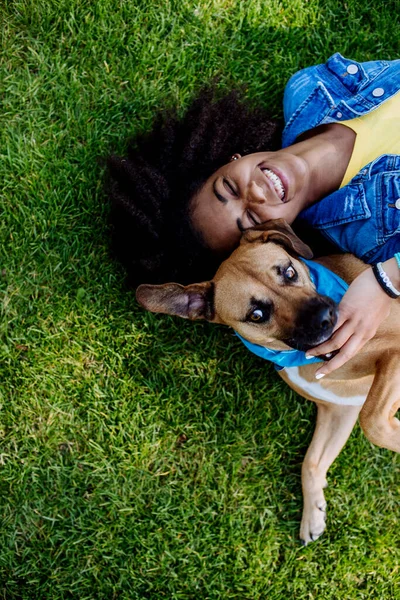 Top View Happy Multiracial Teenage Girl Her Dog Lying Grass — Stockfoto