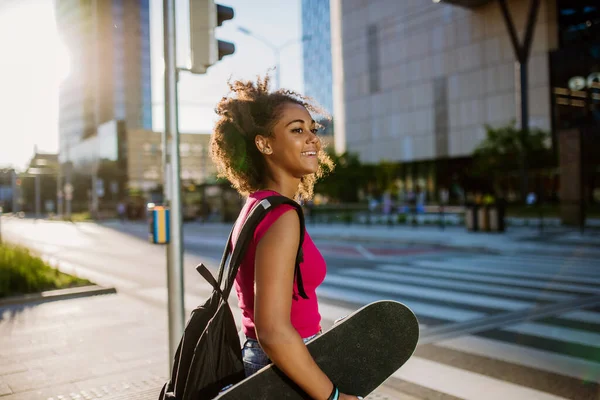 Multiracial Teenage Girl Backpack Skateboard Walking City Summer Day — Foto Stock