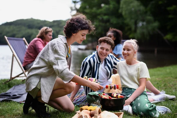 Group Multiracial Young Friends Camping Lake Having Barbecue Together — Zdjęcie stockowe