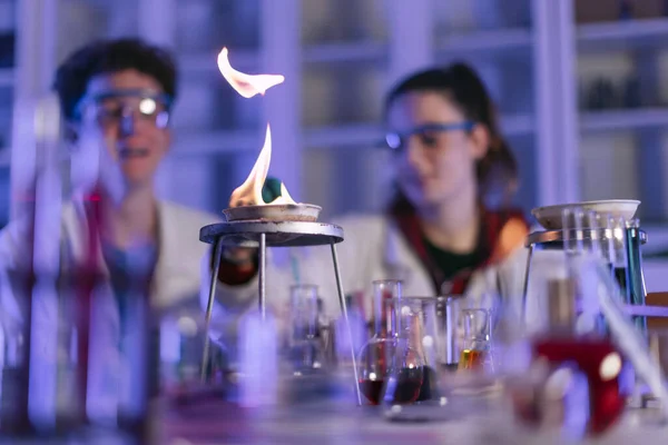 A science student doing chemical experiment in the laboratory at university.