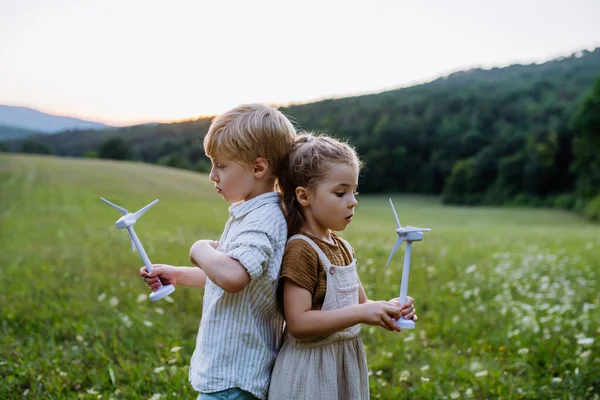 Little Children Standing Nature Model Wind Turbine Concept Ecology Future — Zdjęcie stockowe