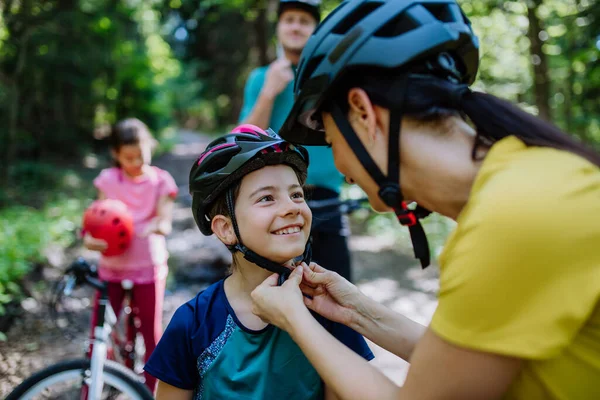 Young Family Little Children Preapring Bike Ride Standing Bicycles Nature — 스톡 사진