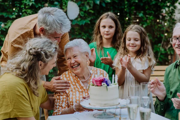 Multi Generation Family Outdoor Summer Garden Party Celebrating Birthday — 스톡 사진