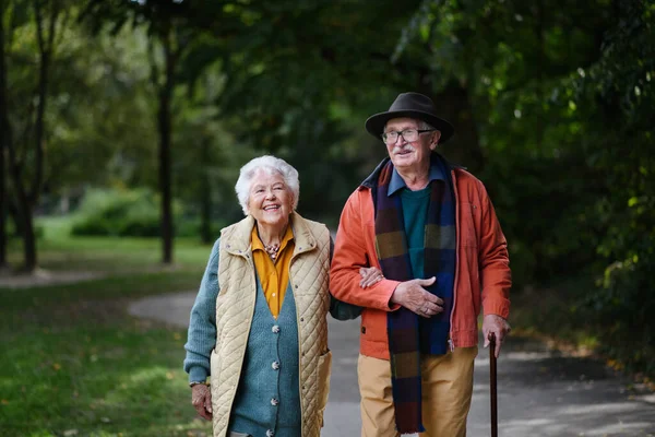 Happy Senior Couple Autumn Clothes Walking Park Together — Stock Photo, Image