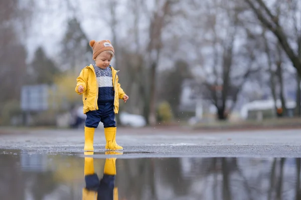 Happy Little Boy Yellow Raincoat Jumping Puddle Rain Cold Autumn — Stock Photo, Image