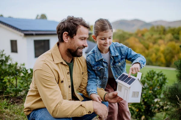 Little Girl Her Father Holding Paper Model House Solar Panels — Stock Photo, Image