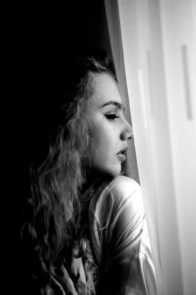 Thoughtful Elegant girl at the window — Stock Photo, Image