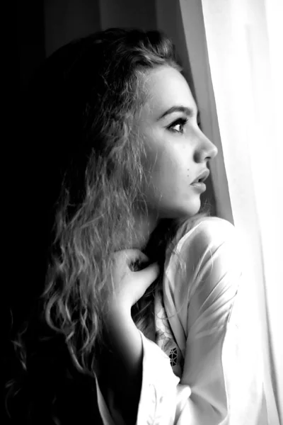 Thoughtful Elegant girl at the window — Stock Photo, Image