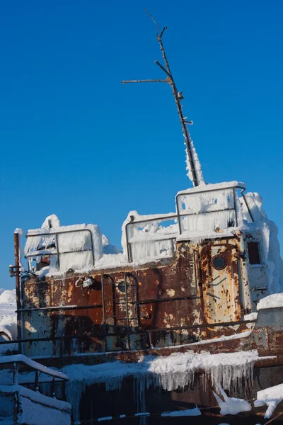 Rusty ship frozen in the ice — Stock Photo, Image