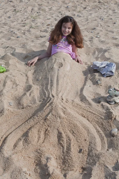 Girl covered with sand — Stock Photo, Image