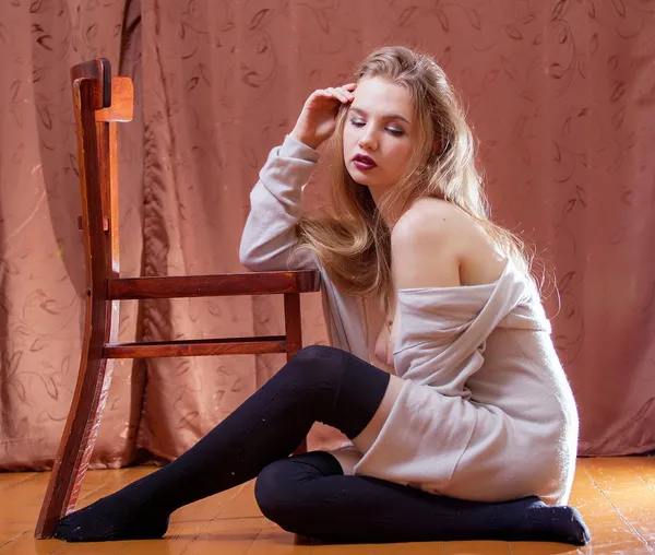 Beauty shy girl in wool cardigan — Stock Photo, Image