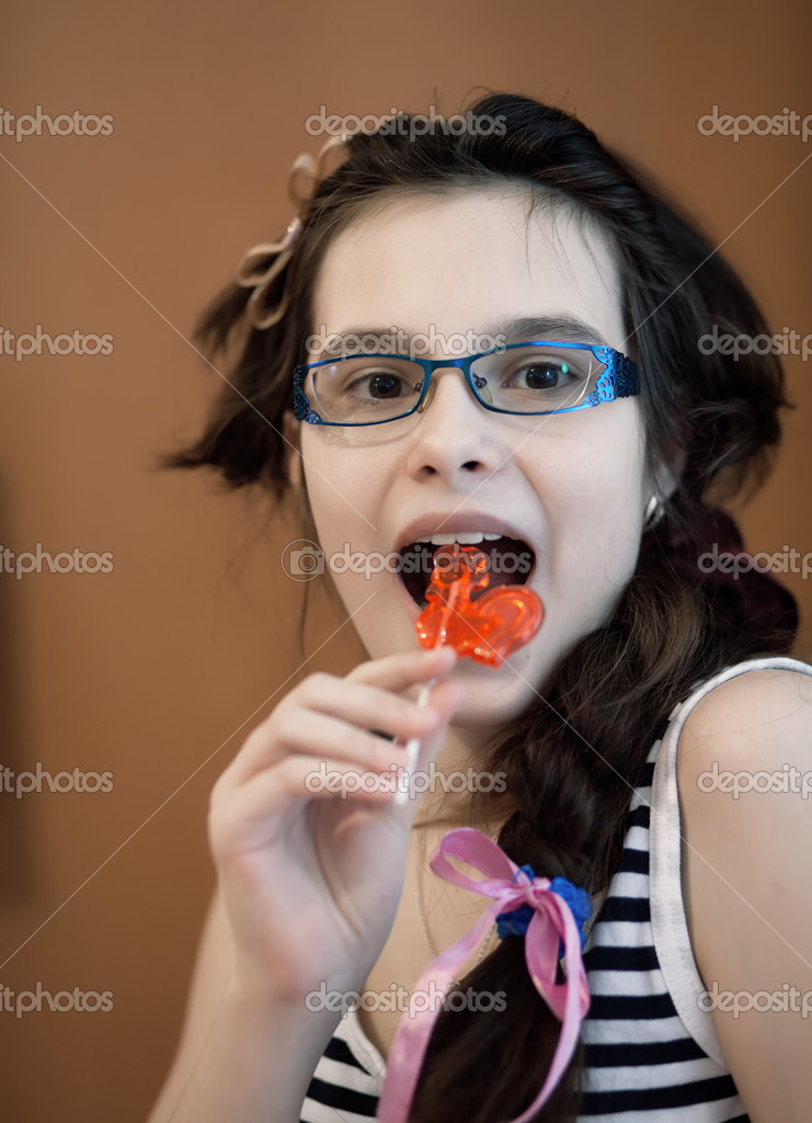 Girl Eating Candy â Stock Photo Image By â Tosher 39824017 Girl Eating Candy â Stock Photo Image By â Tosher 39824017