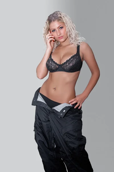 Sexy junge Snowboarderin — Stockfoto