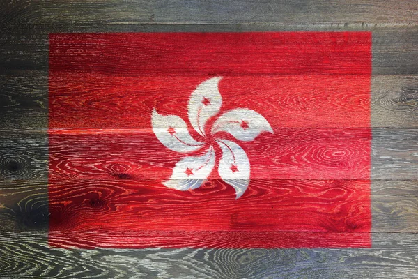 Hong Kong flag on rustic old wood surface background — Stock Photo, Image