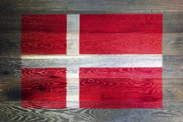 Danimarca bandiera su sfondo rustico vecchia superficie di legno — Foto Stock