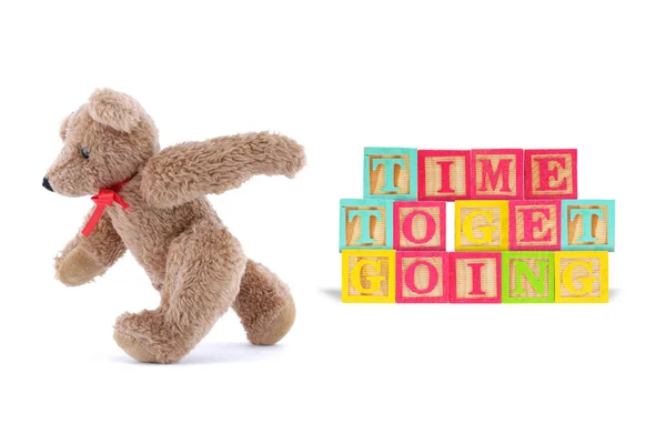 Time to get going business concept with wood blocks and teddy bear — 图库照片