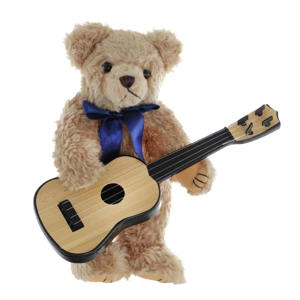 Cute brown teddy bear playing a guitar — 图库照片