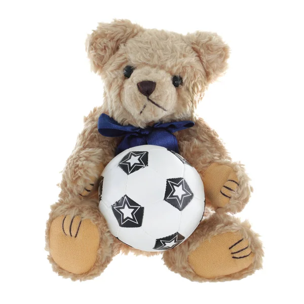 Cute teddy bear holding a football soccer ball — Zdjęcie stockowe