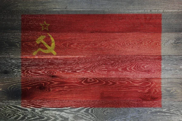 USSR flag on rustic old wood surface red yellow hammer sickle CCCP — Stock Photo, Image