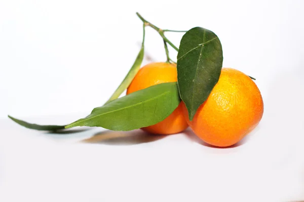 Orange mandarins with green leaf isolated on white background — Stock Photo, Image