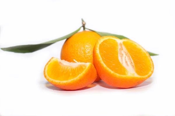 Orange mandarins with green leaf isolated on white background — Stock Photo, Image