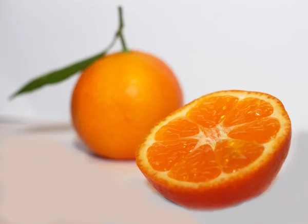 Orange mandarins with green leaf isolated on white background — Stock Photo, Image