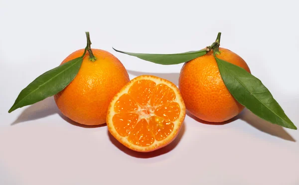 Orange mandarins with green leaf isolated on white background — Stock Photo, Image