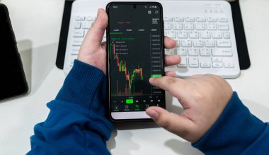 Çocuk ticareti, teknoloji ile finansal grafikleri borsa konseptini analiz eder