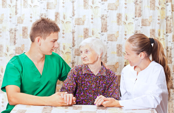 Elderly woman with the young doctor