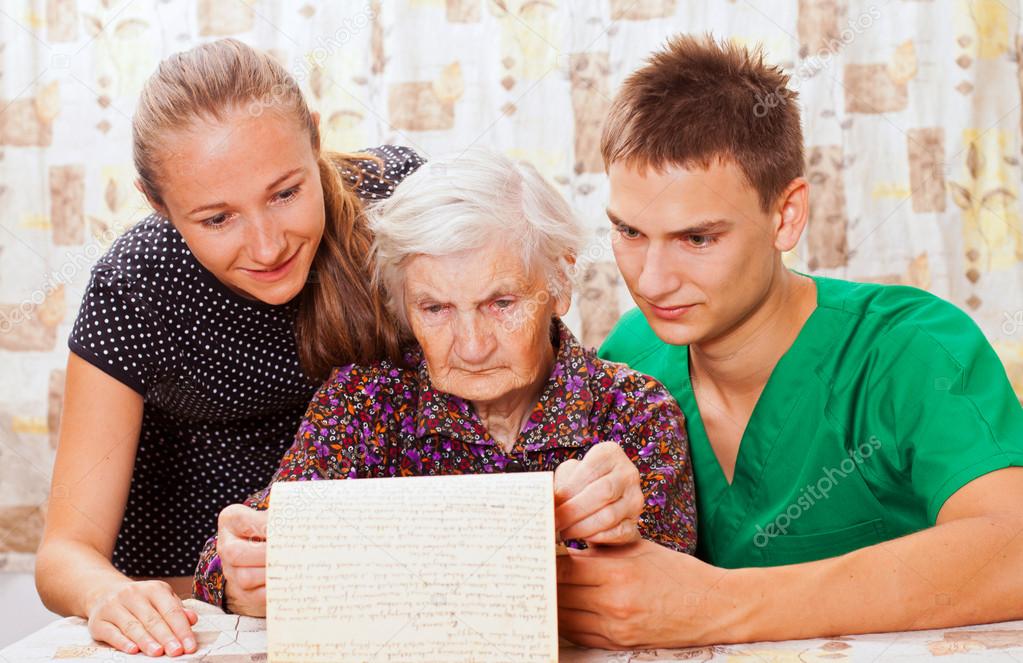 Elderly woman with the sweet young doctors