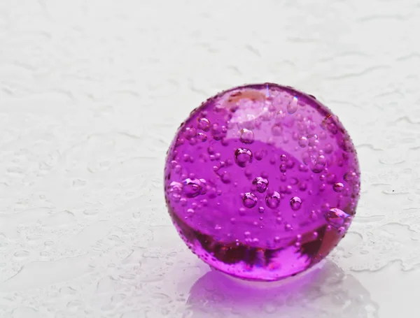 Many little pink air bubble in the glass sphere — Stock Photo, Image