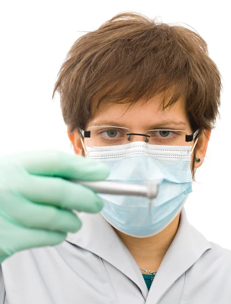 The young doctor examine the drill — Stock Photo, Image