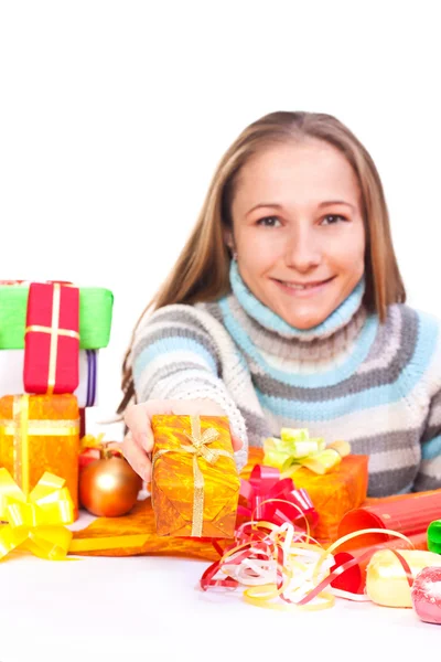 Sweet young girl with christmas present — Stock Photo, Image