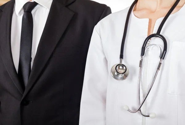 Doctor and businessman — Stock Photo, Image