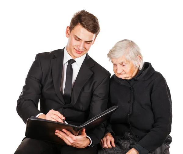 Elderly woman and young businessman — Stock Photo, Image