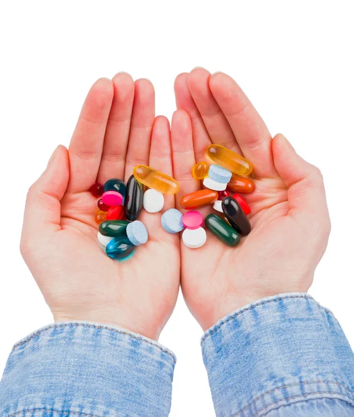 Pills in hands — Stock Photo, Image