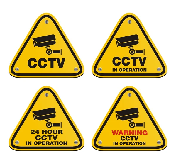 CCTV en funcionamiento - signo amarillo — Vector de stock