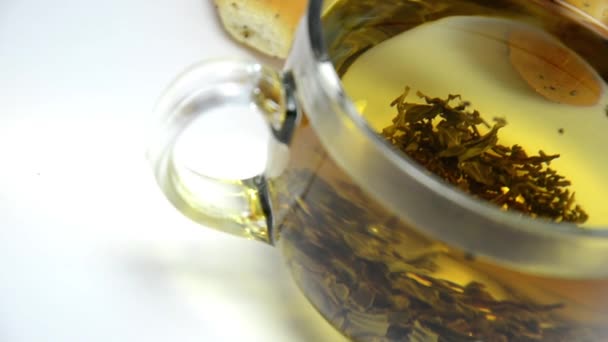 Té en un vaso y rosquillas — Vídeos de Stock